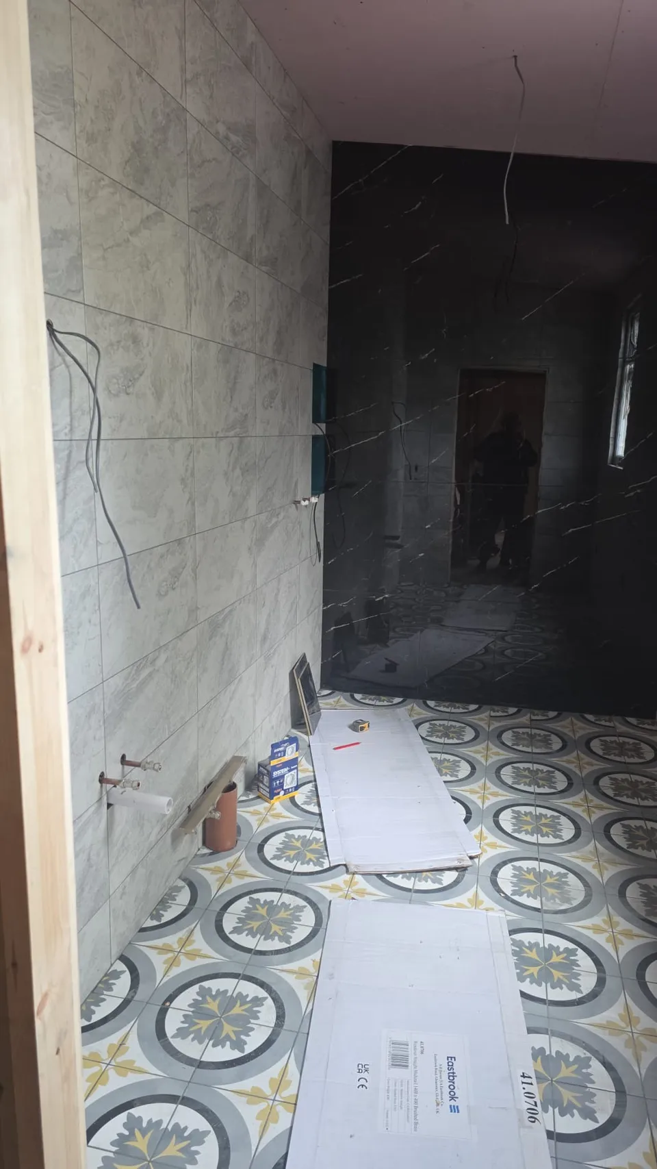 Bathroom wall and floor tiling during renovation